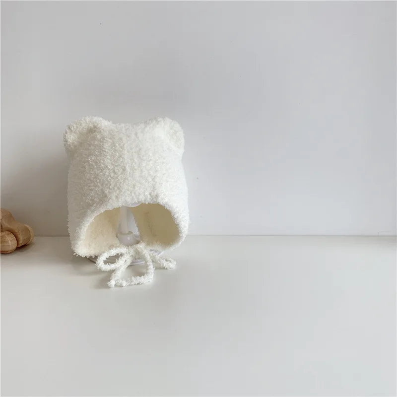 Warme Baby Muts van Lamsvacht – Met Oorflapjes & Touwtjes