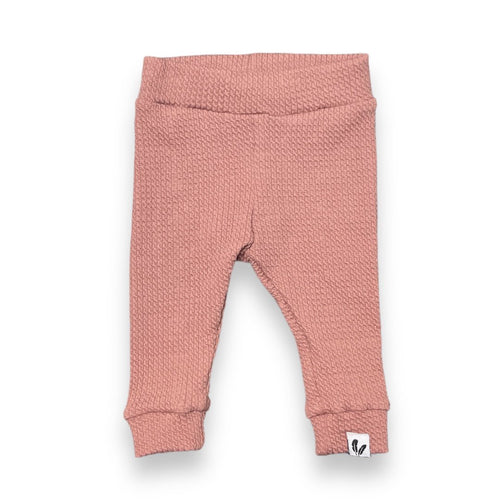 Newborn broekje cable clay pink