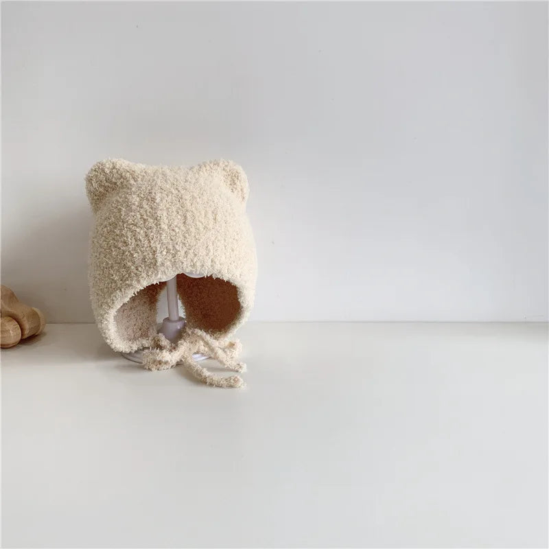 Warme Baby Muts van Lamsvacht – Met Oorflapjes & Touwtjes