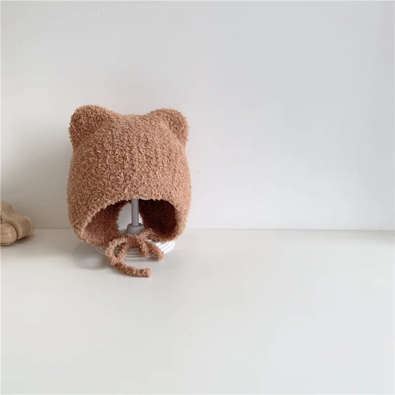 Warme Baby Muts van Lamsvacht – Met Oorflapjes & Touwtjes